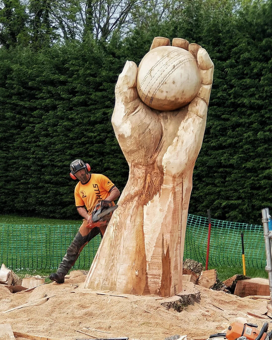 Hand holding a cricket ball - Dan Cordell